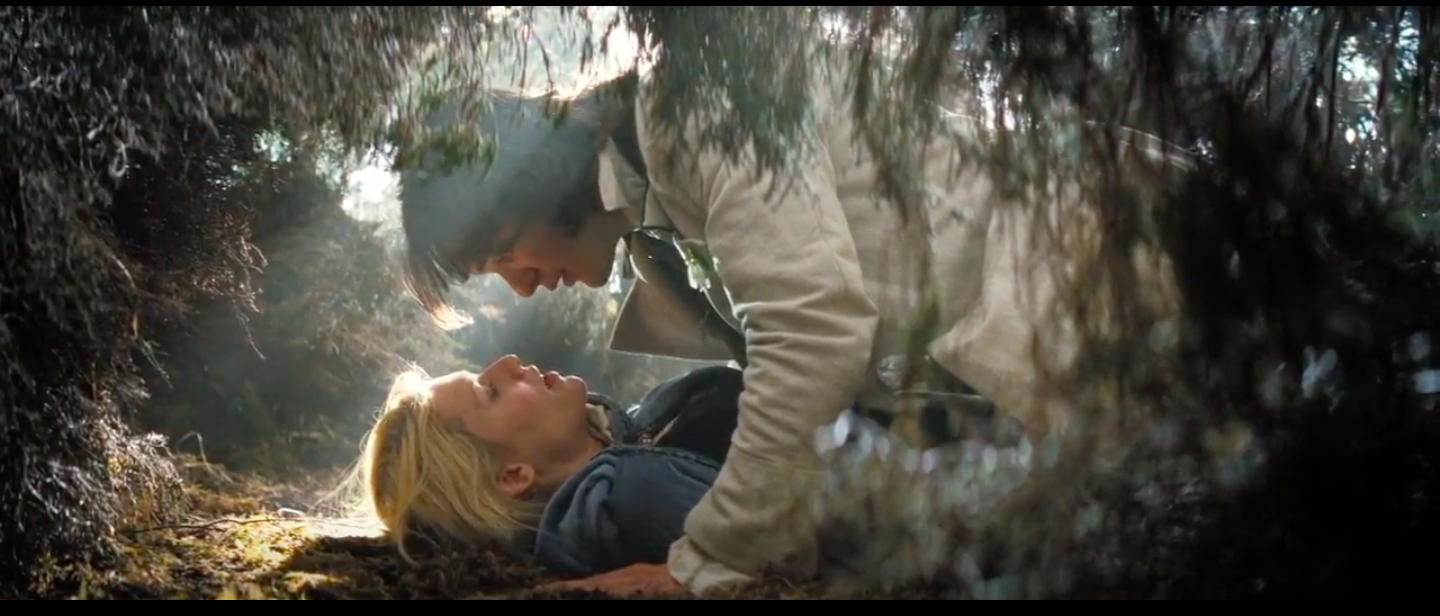 A still from Stardust of Tristan fallen on top of Yvaine, who's on her back on the ground